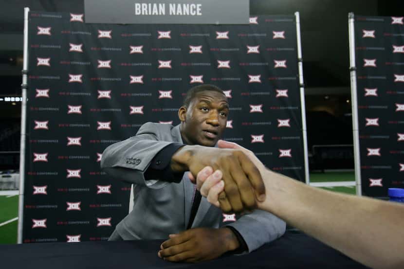 Baylor defensive end Brian Nance shakes hands after giving an interview during the Big 12...