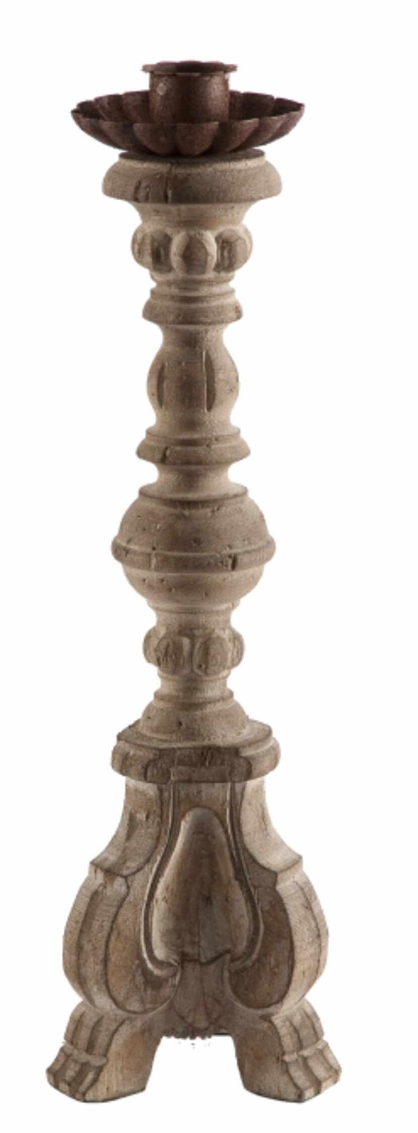 For the traditionalist, the Turin pillar candlestick rises 14 inches and includes a drip...