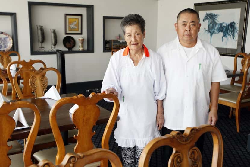 Owners Tamako Ino, 82, left, and Toyoji Ino, 62, in the main dining room at Ino Japanese...