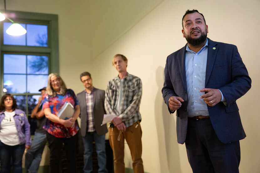 City Council member Jesse Moreno, right, and city staff members lead a meeting at Old City...