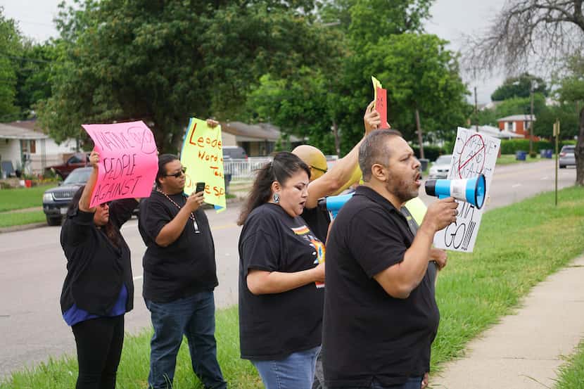 Inter-Tribal Community Council Chairman Keith Pahcheka leads a small group of protesters who...