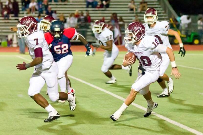
Former Lewisville High School quarterback Cory Duran takes off on a run in a 2011 game...