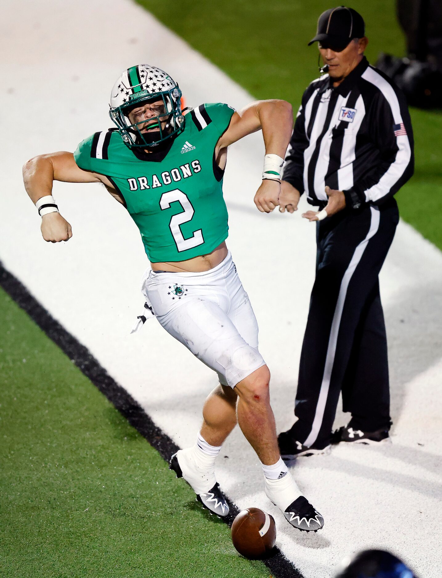 Southlake Carroll running back Owen Allen (2) celebrates his third quarter touchdown run...