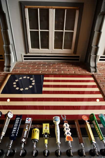 Behind the bar, Hillside Tavern has a replica of an American Flag from the 1700s.