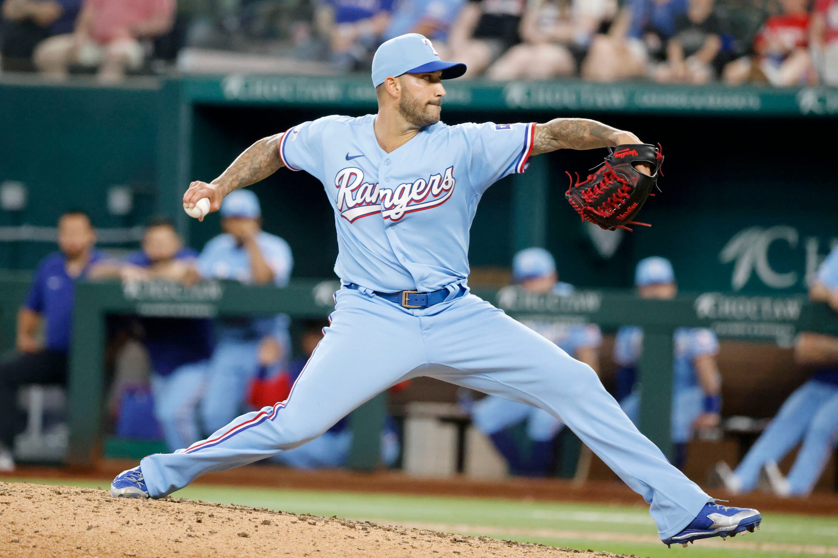 Texas Rangers relief pitcher Matt Bush (51) pitches against the Atlanta Braves during the...