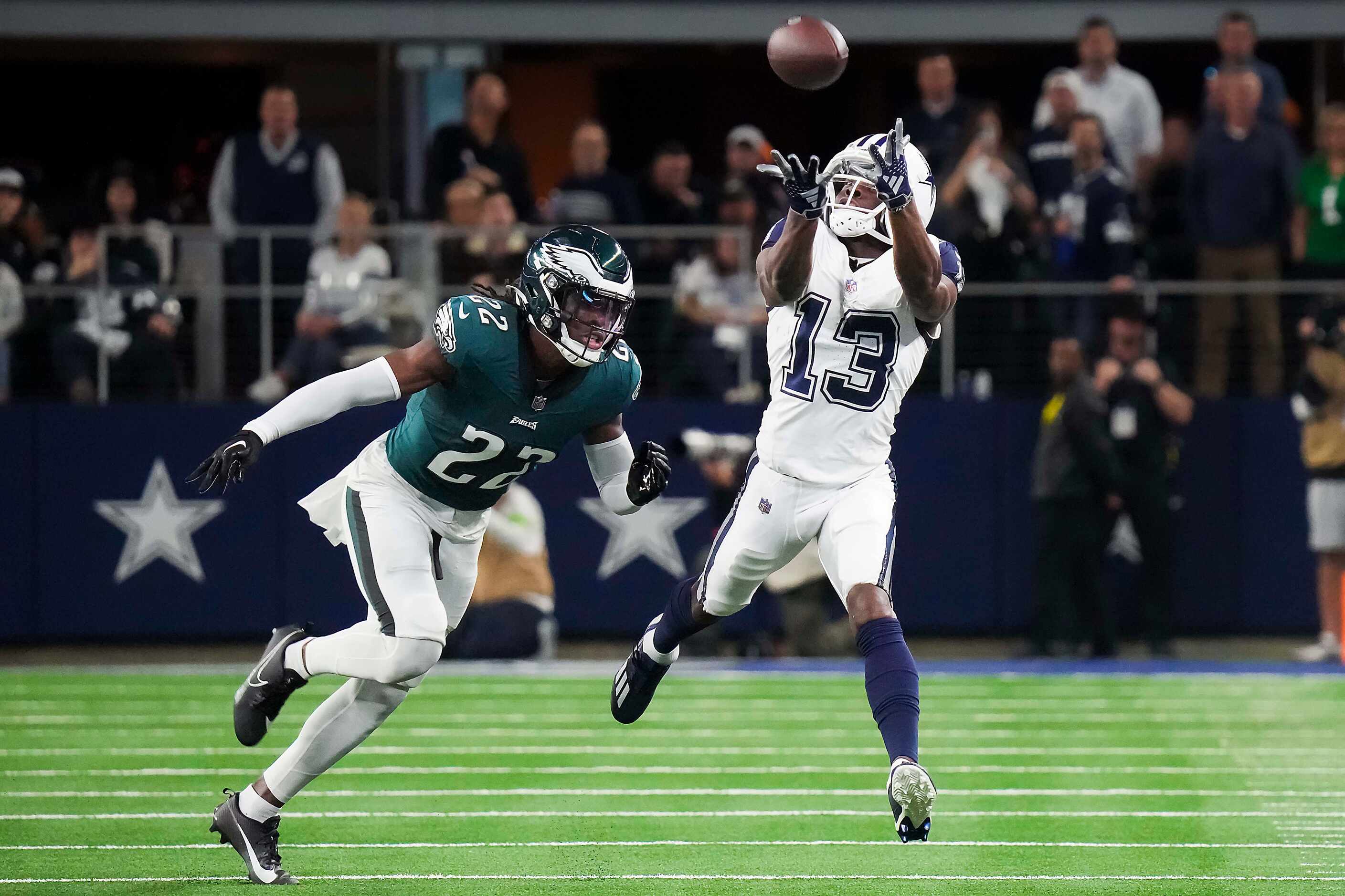 Dallas Cowboys wide receiver Michael Gallup (13) hauls in a 38-yard pass from quarterback...