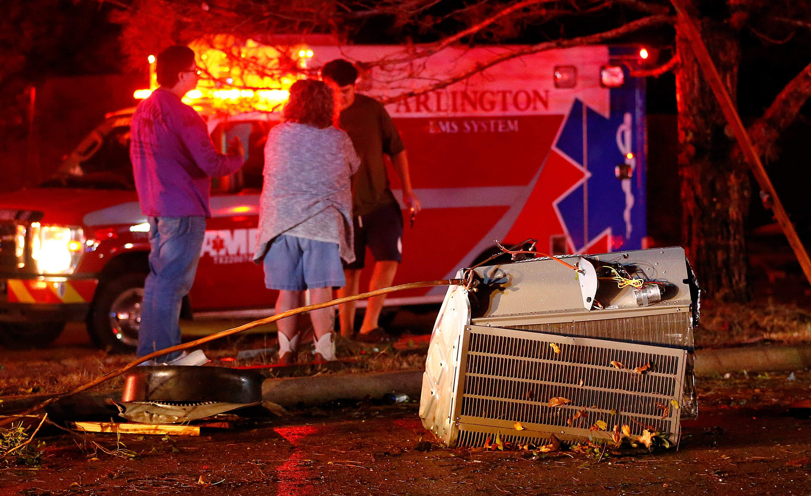Air conditioner units were scattered across Pioneer Parkway in Arlington after a...