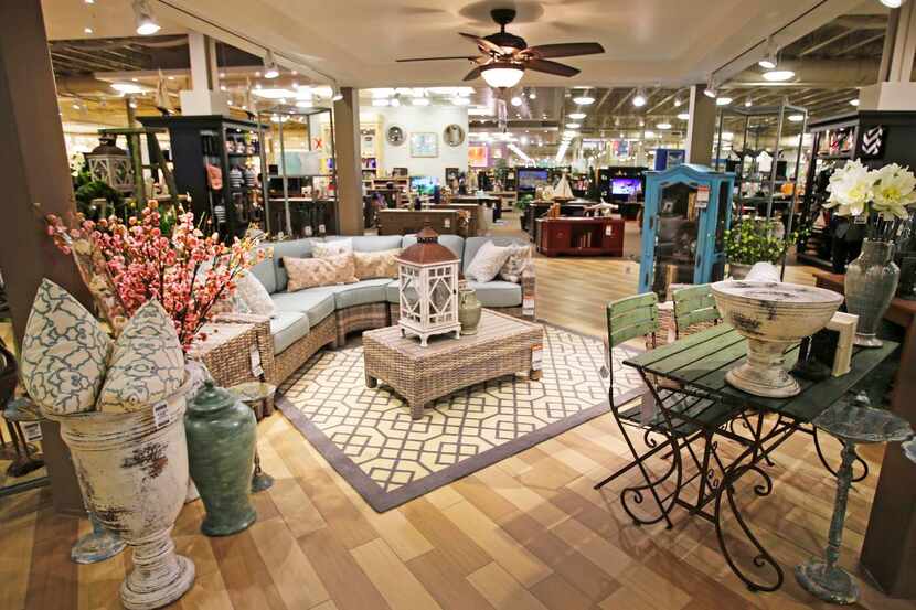 
Furniture displays at Nebraska Furniture Mart are arranged by style, and the floor is...