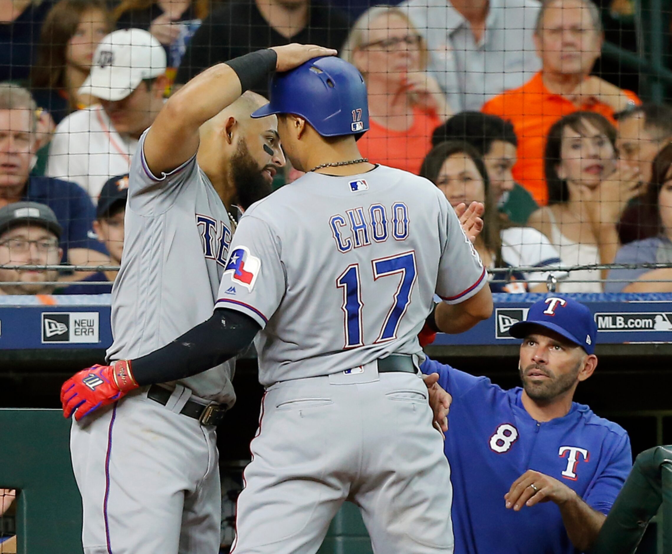 HOUSTON, TEXAS - JULY 20: Shin-Soo Choo #17 of the Texas Rangers is congratulated by Rougned...