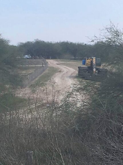 A photo taken Sunday, Feb. 3, 2019 shows construction equipment parked on land immediately...