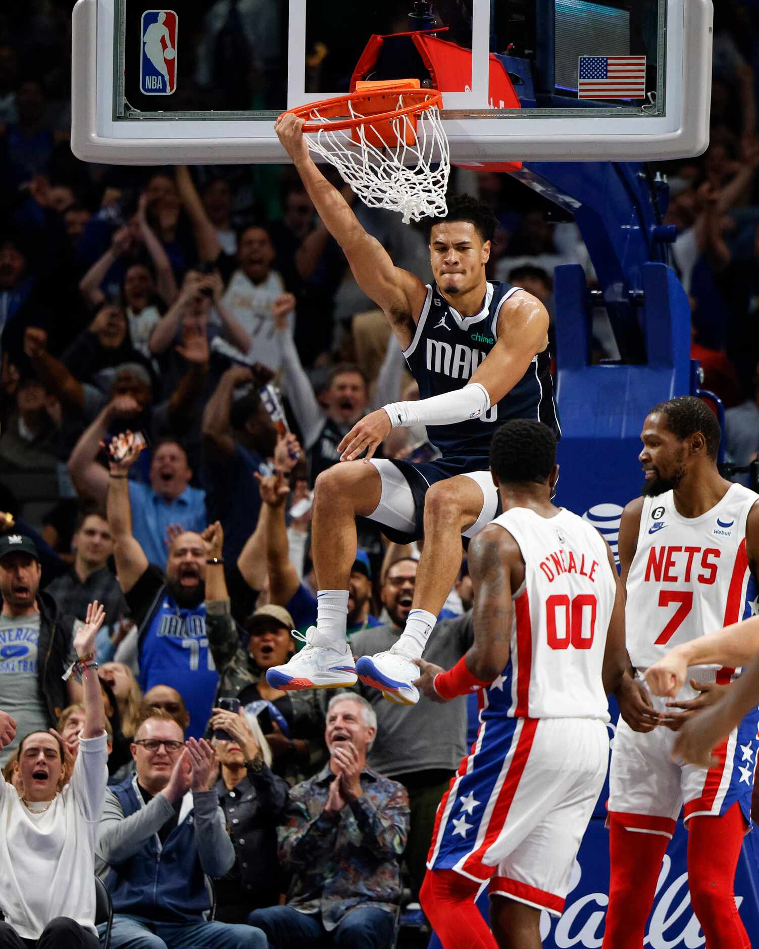 Dallas Mavericks guard Josh Green (8) dunks the ball during the second half of an NBA game...