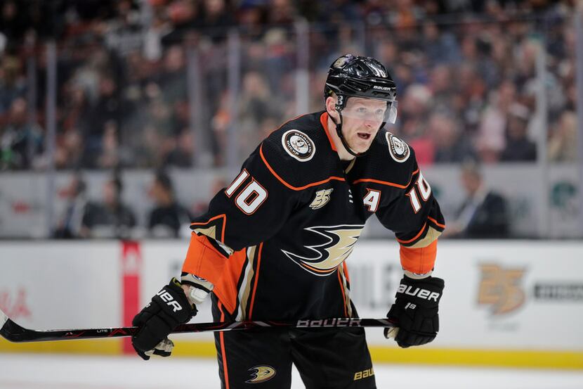 FILE - In this Thursday, March 7, 2019 file photo, Anaheim Ducks' Corey Perry stands on the...