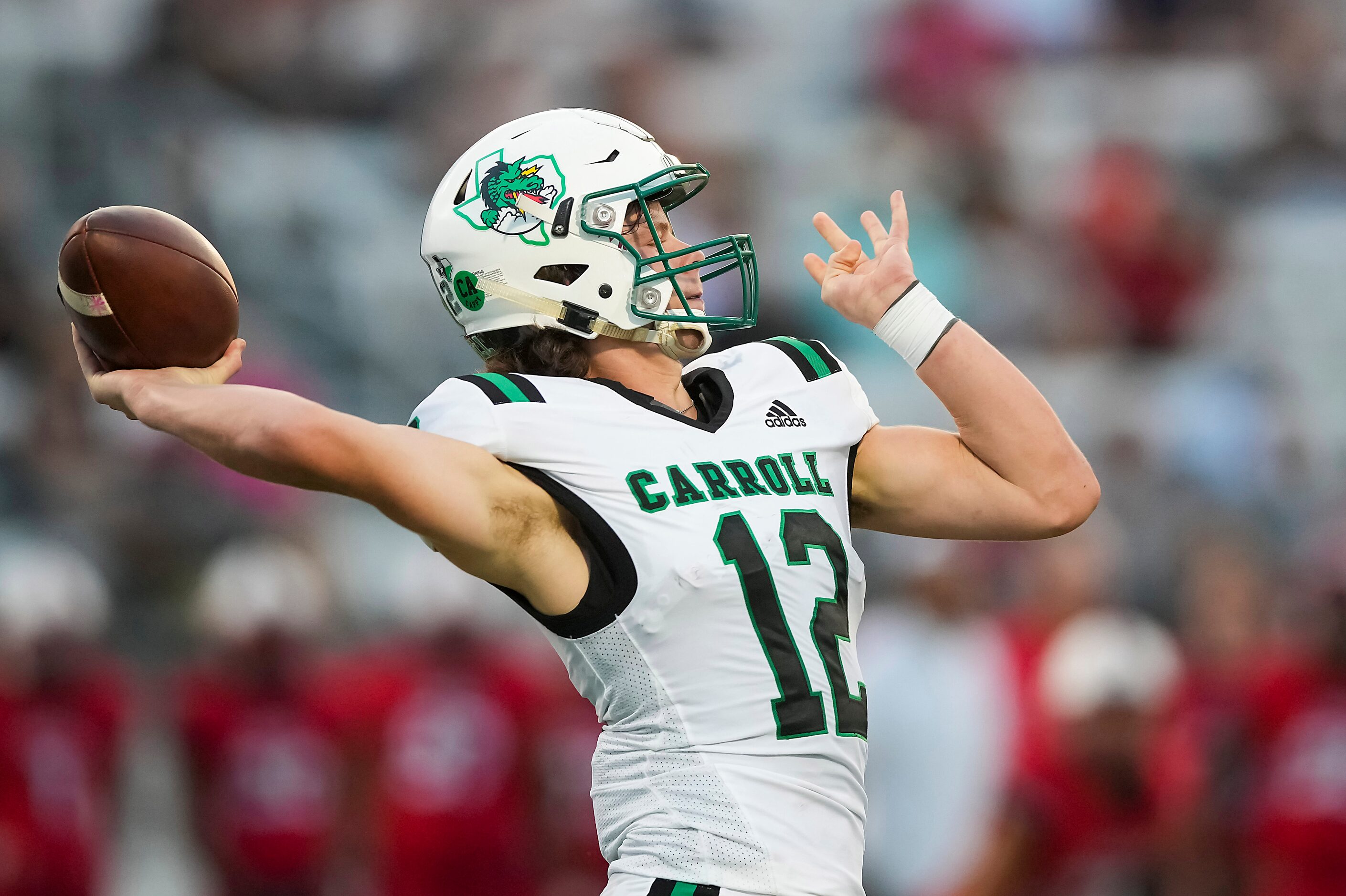 Southlake Carroll quarterback Kaden Anderson (12) throws a 72-yard touchdown pass to wide...