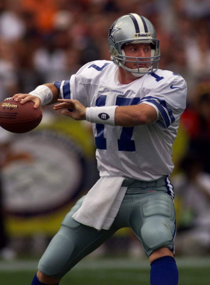 Dallas quarterback Jason  Garrett looks to pass during the Cowboys game against the Denver...