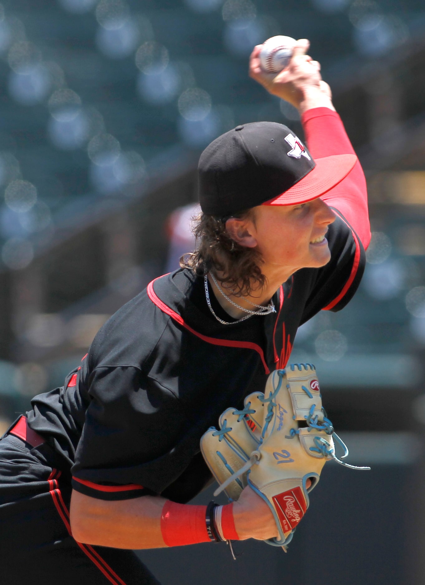 Lovejoy pitcher Logan Corley (21) delivers a pitch to a Grapevine batter during the bottom...