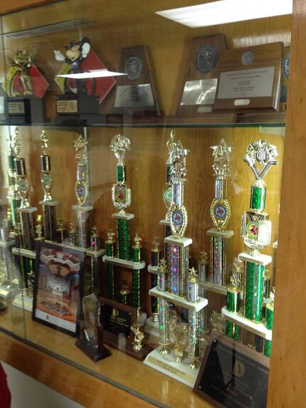 Travis' band trophies collected during Randy McCann's tenure as band director