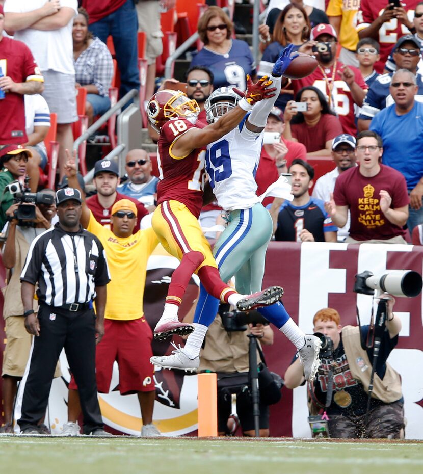 Cowboys cornerback Brandon Carr (39) knocks away a pass intended for Redskins wide receiver...