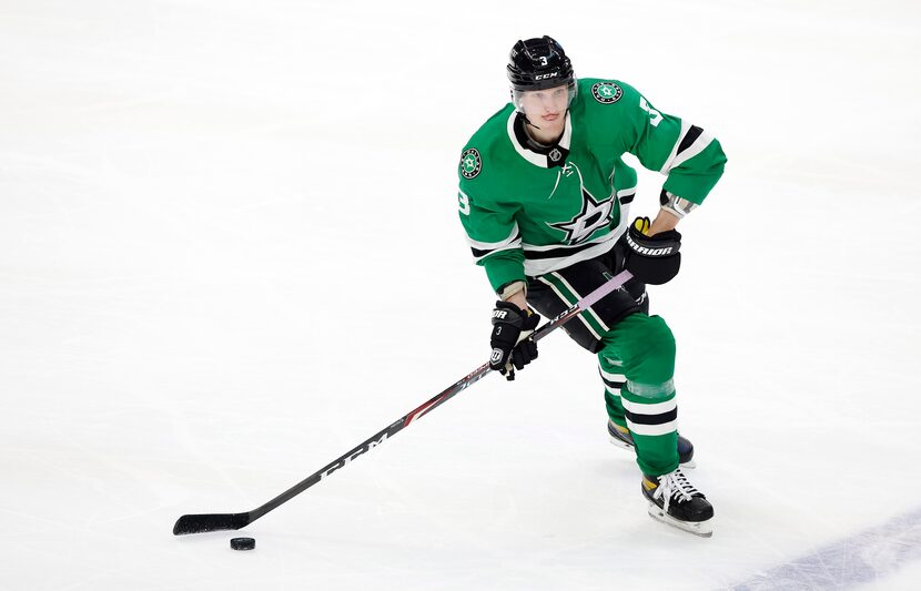 Dallas Stars defenseman John Klingberg (3) controls the puck at mid-ice the Stars play the...