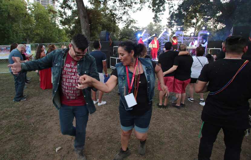 Erwin K. (left)  danced with his mother Carmen at Texas Latino Pride in October at Reverchon...