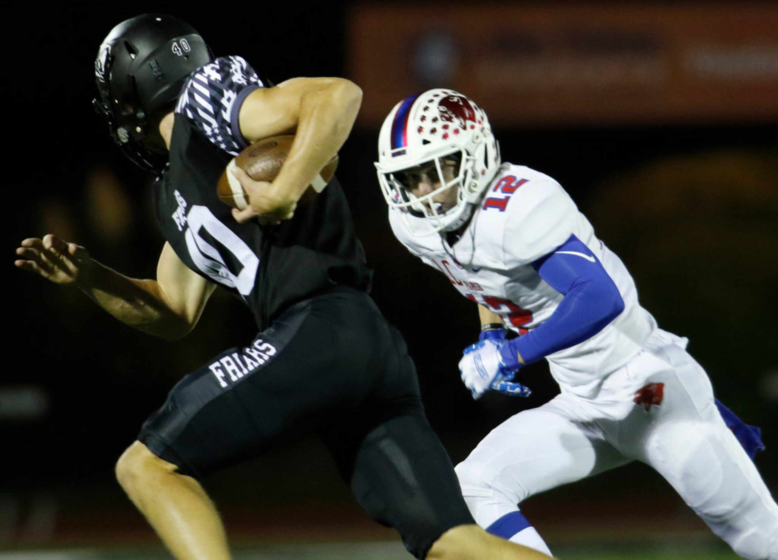 Bishop Lynch receiver Westin Walls (40) tacks on yardage after the catch as Parish Episcopal...