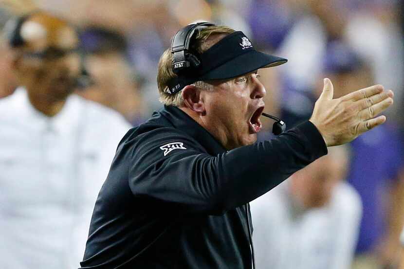 TCU Horned Frogs head coach Gary Patterson yells to his players as they faced the Kansas...