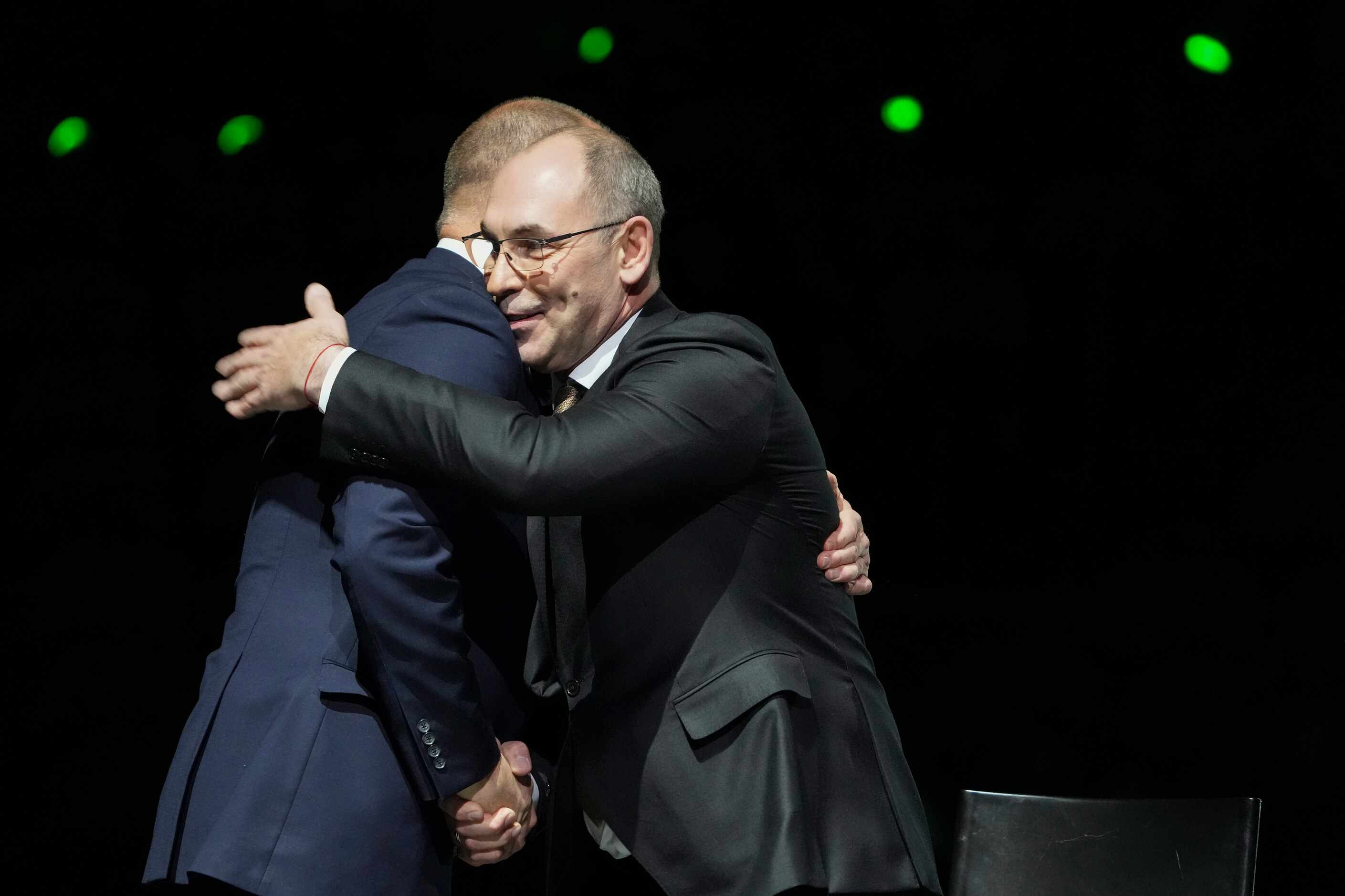 Former Dallas Stars player Sergei Zubov is congratulated during ceremonies for his jersey...