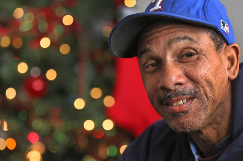 Willie Hodge is pictured in his apartment with his Christmas tree that he obtained when...