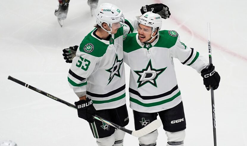 Dallas Stars center Wyatt Johnston, left, congratulates center Logan Stankoven after he...