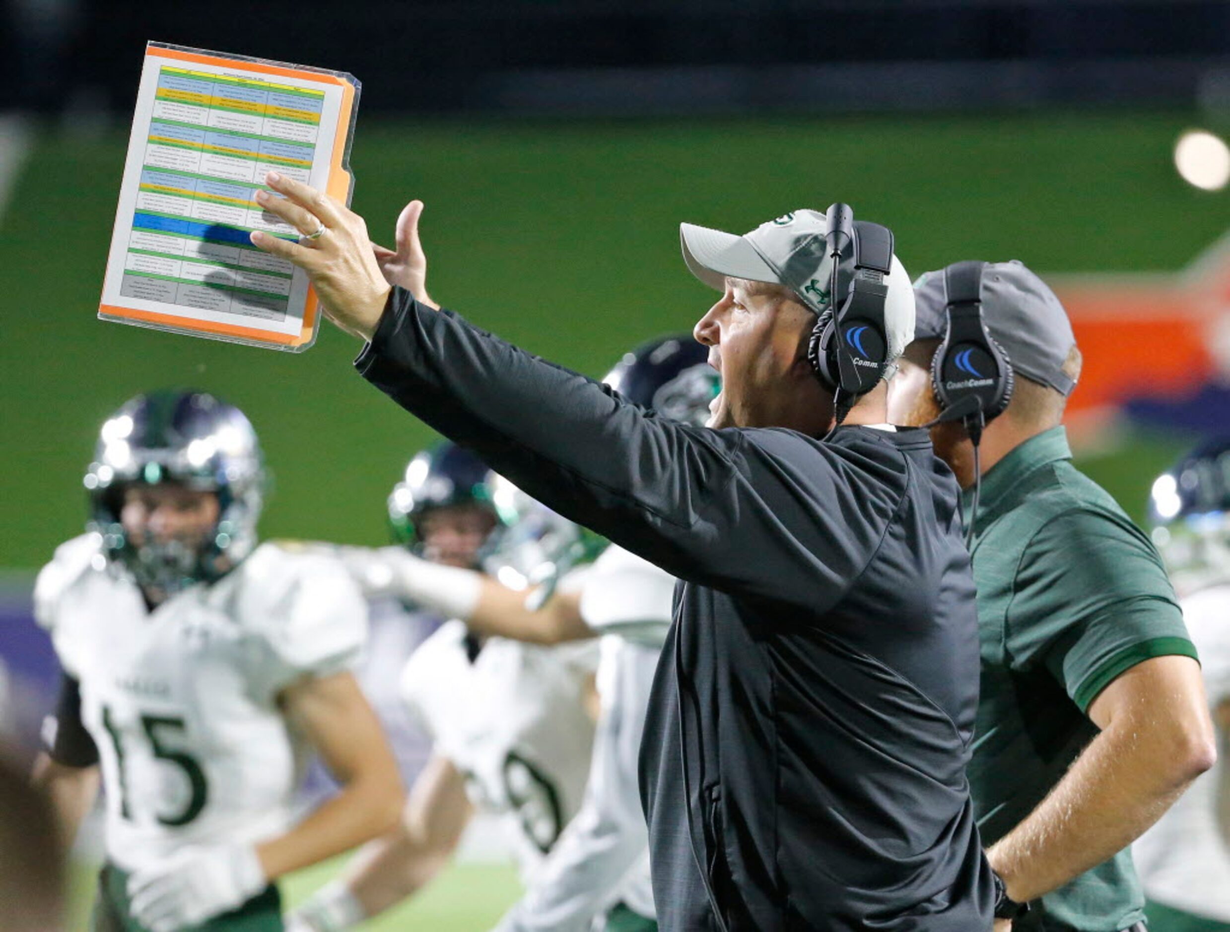 Prosper head coach Brandon Schmidt exhorts his troops during the second quarter during the...