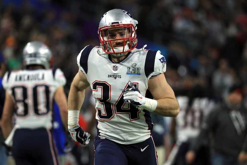 MINNEAPOLIS, MN - FEBRUARY 04: Rex Burkhead #34 of the New England Patriots runs on the...