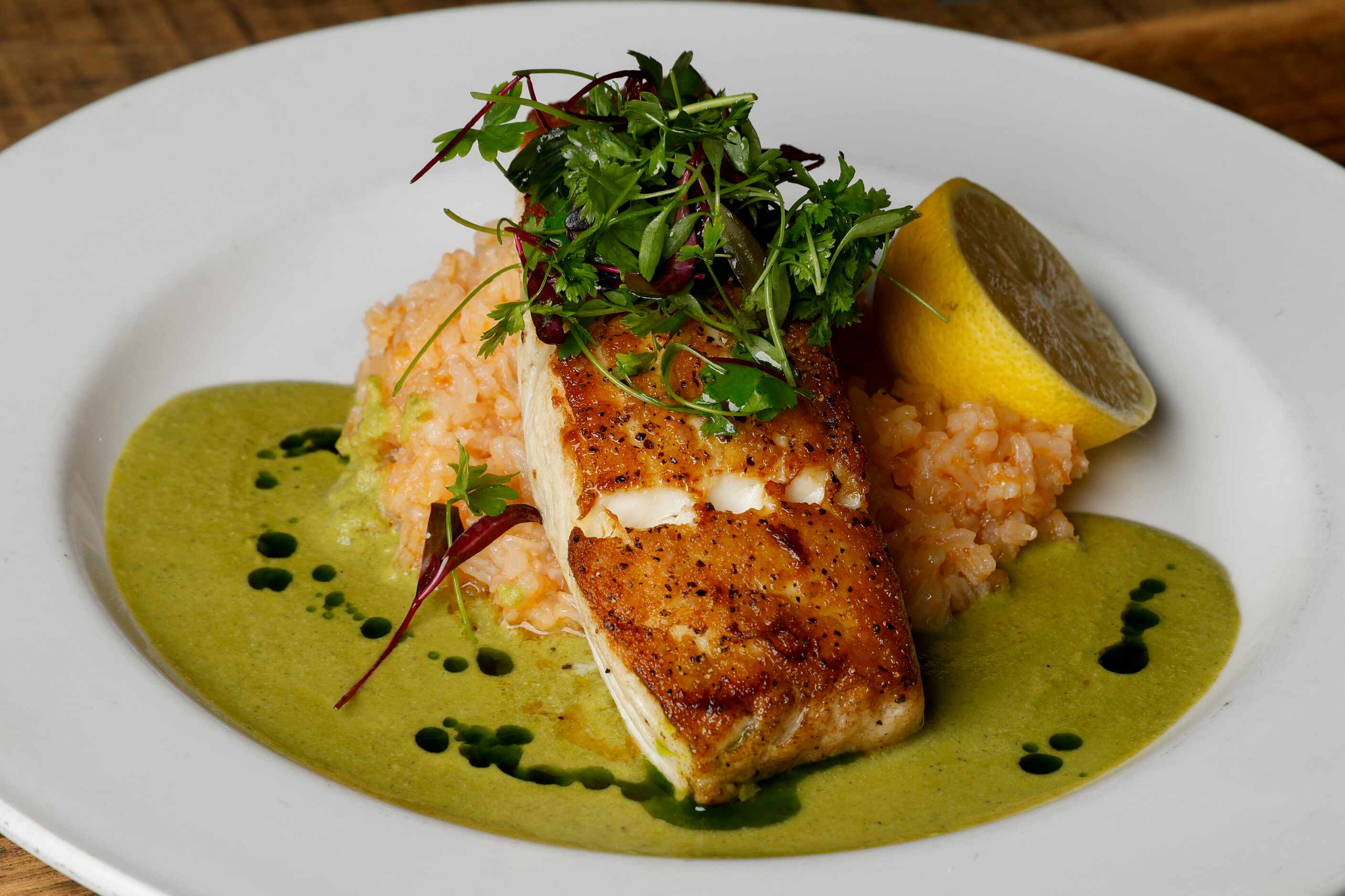 Seared Atlantic halibut pictured at Henrys Majestic, Monday, Nov. 6, 2023, in Dallas.