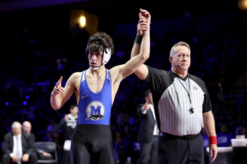 Eli Biermann of Midlothian (blue) defeats Nathaniel Ruiz of Canyon Randall  Boys 5A...