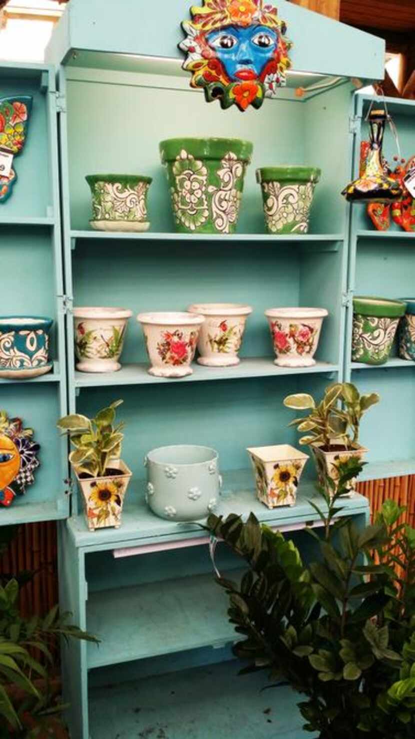 Specialty pottery in island-loving colors are featured at Tom's Thumb Nursery & Landscaping...
