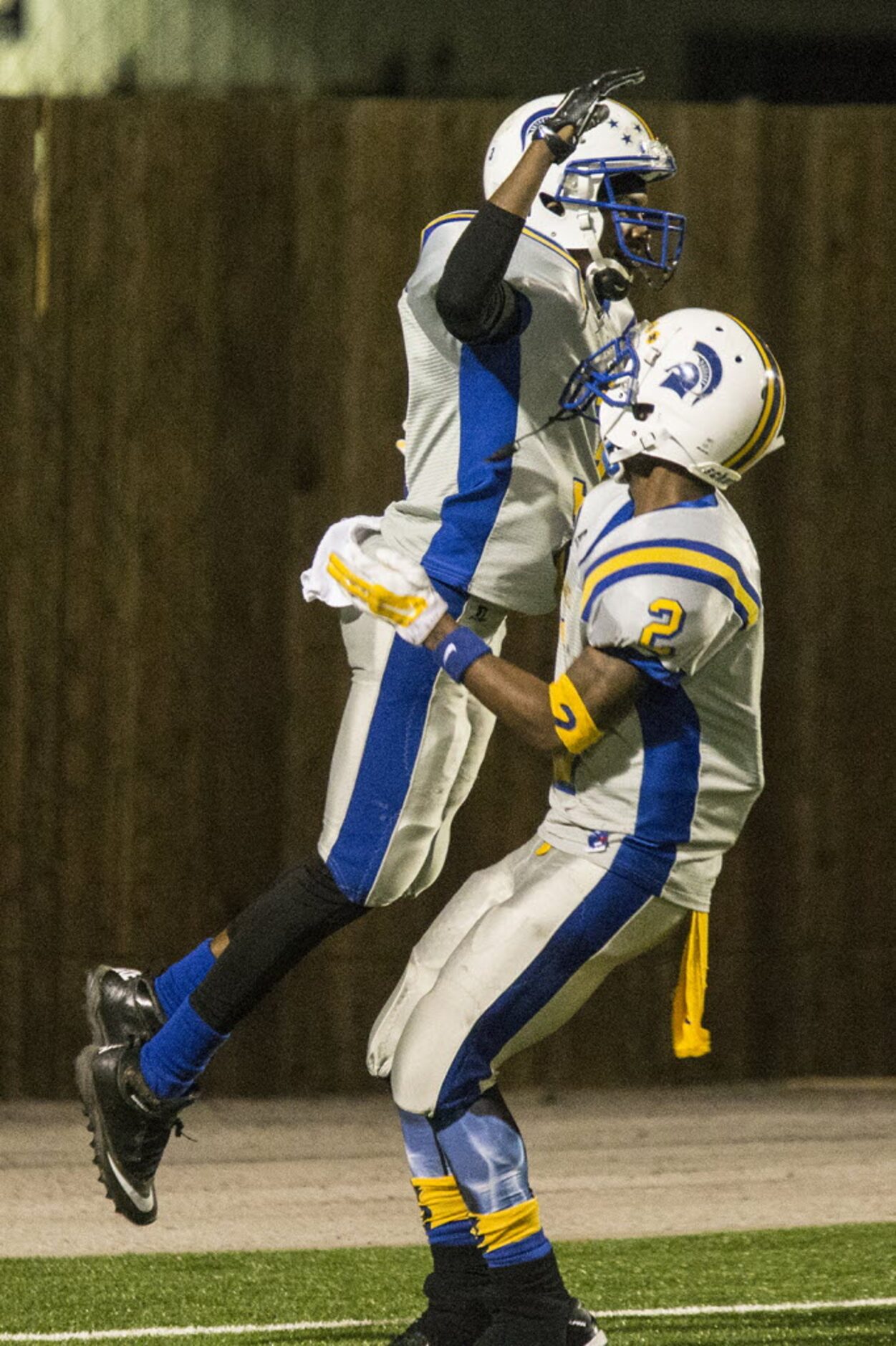 Samuell's Moriease Benard (3) and Darionta Choice (2) celebrate a touchdown during W. W....