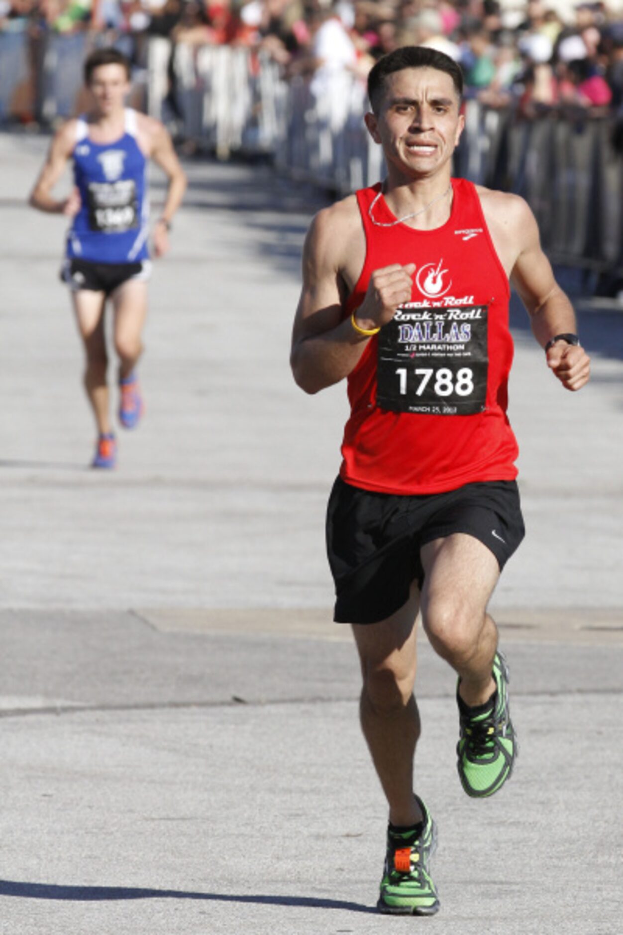 Tomas Moreno runs in the Dallas Rock 'N' Roll half marathon on Sunday, March 25, 2012.