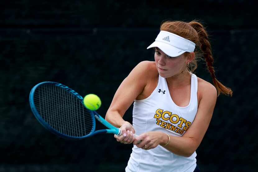 Highland Park’s Isabella McElfresh hits the ball during a 5A girls doubles match at the UIL...