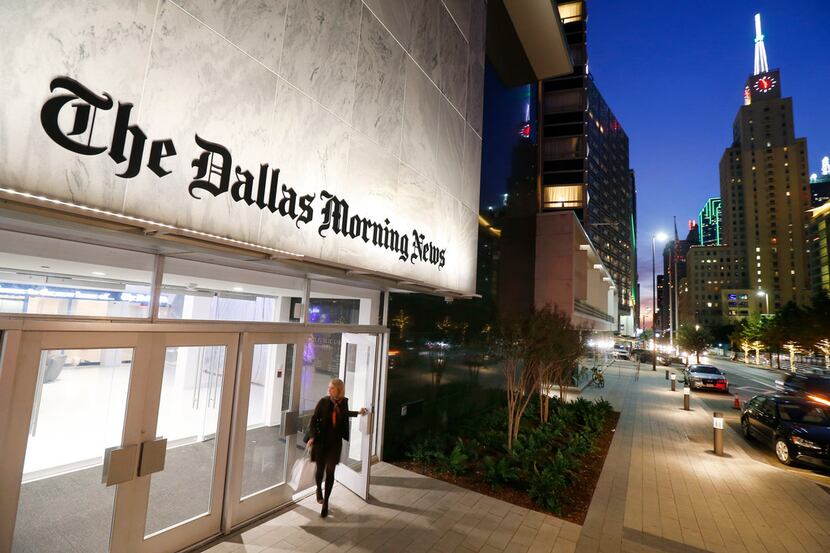 The exterior of the Dallas Morning News building in the old Dallas Public Library,...