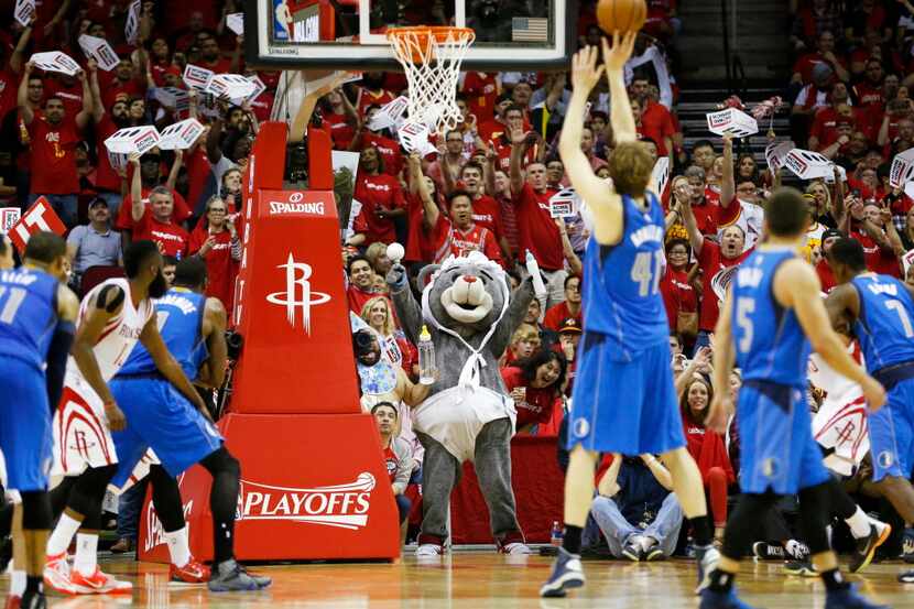 Dallas Mavericks forward Dirk Nowitzki (41) shoots a free throw as the Houston Rockets...