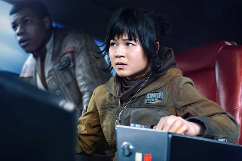 This image released by Lucasfilm shows Kelly Marie Tran as Rose and John Boyega as Finn,...