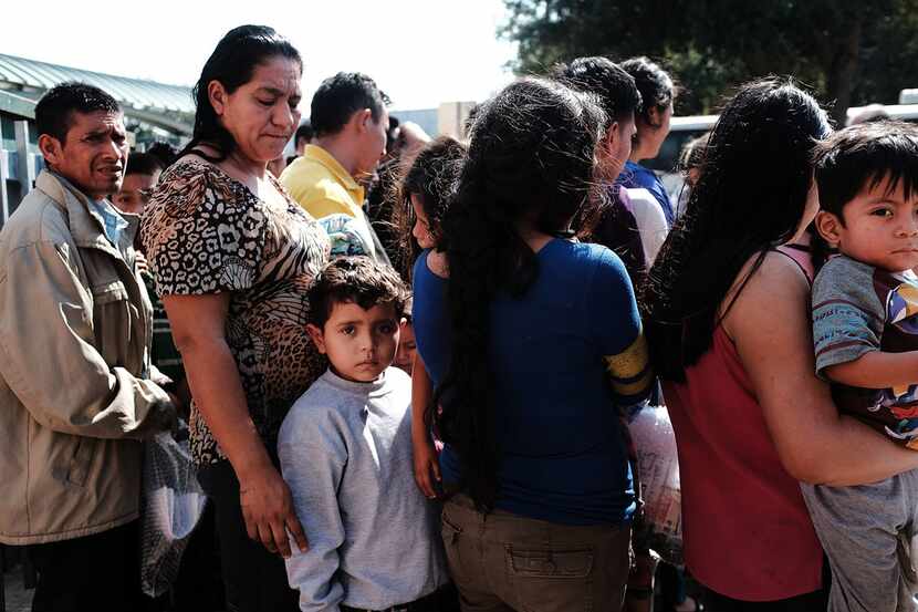 MCALLEN, TX - JUNE 23: Dozens of women, men and their children, many fleeing poverty and...
