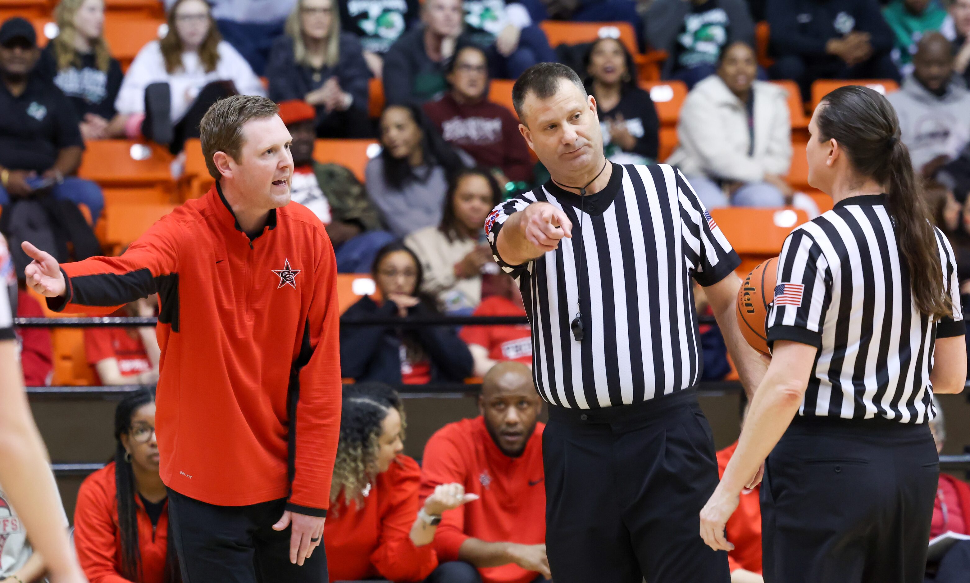 Coppell head coach Ryan Murphy disagrees with a foul called during a Class 6A Region I...