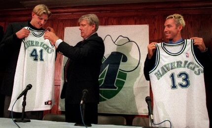 Mavericks coach Don Nelson (center) presents first-round draft pick Dirk Nowitzki (left) and...