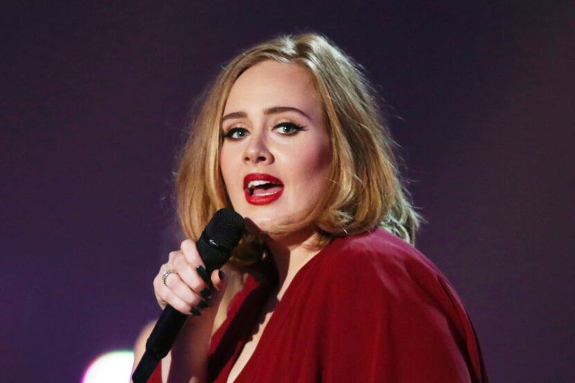 FILE - In this Feb. 24, 2016 file photo shows Adele onstage at the Brit Awards 2016 at the...