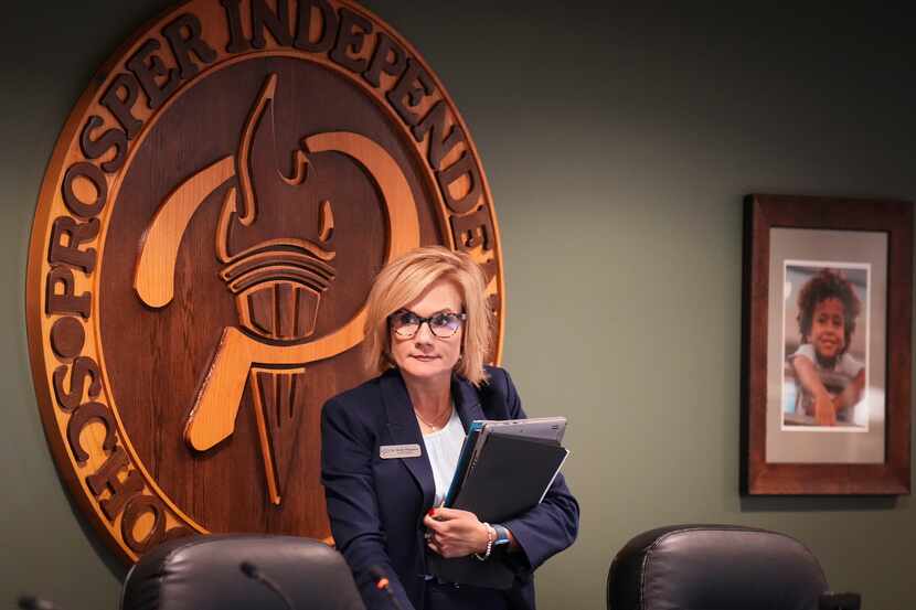 Superintendent Holly Ferguson takes her seat after returning from executive session during a...