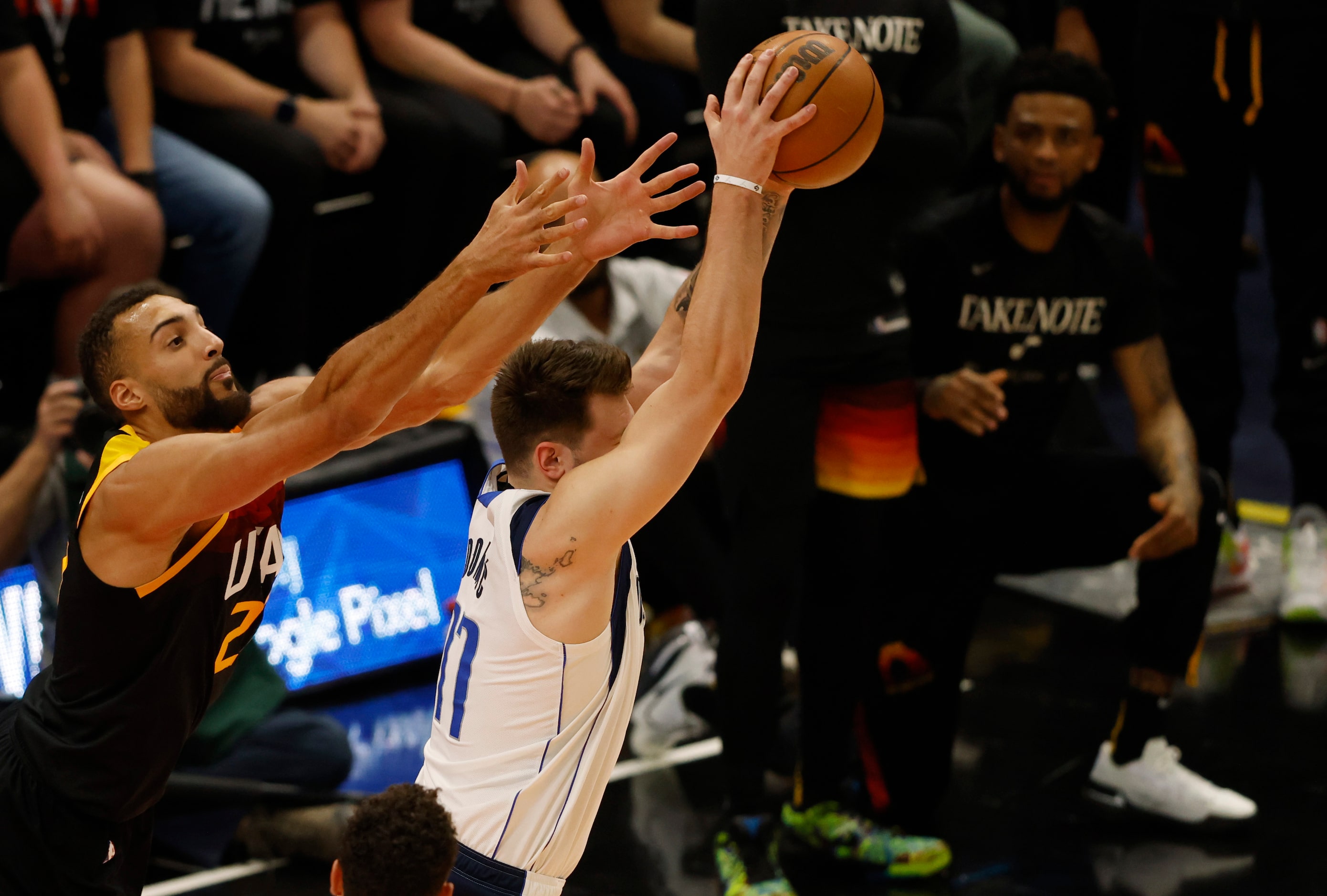 Dallas Mavericks guard Luka Doncic (77) steals the ball on a pass intended for Utah Jazz...