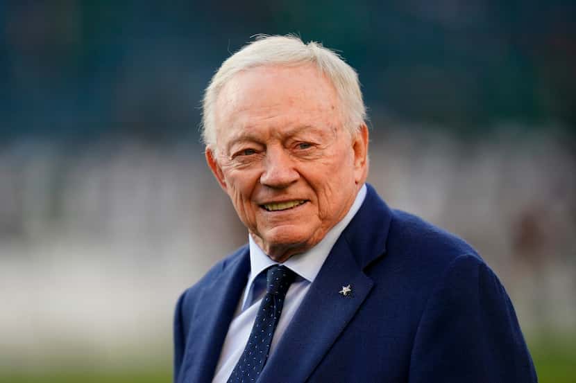 Dallas Cowboys owner Jerry Jones walks on the field before an NFL football game against the...