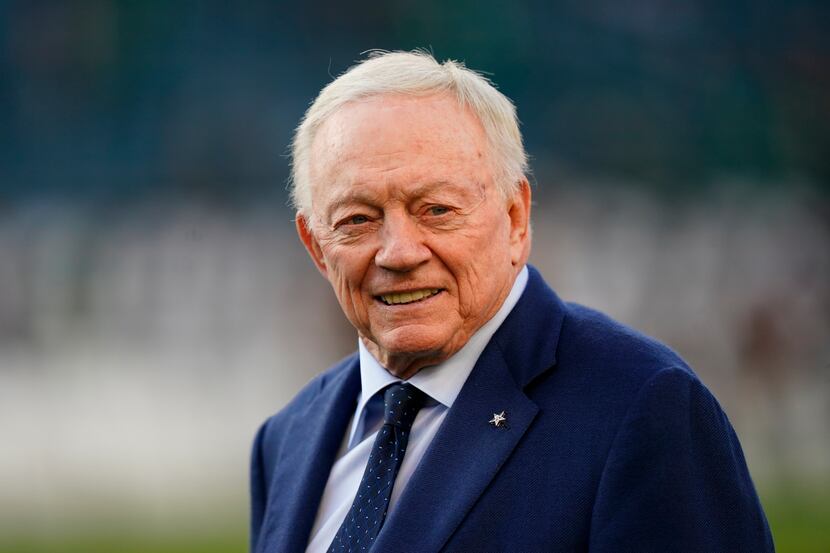 Dallas Cowboys owner Jerry Jones walks on the field before an NFL football game against the...