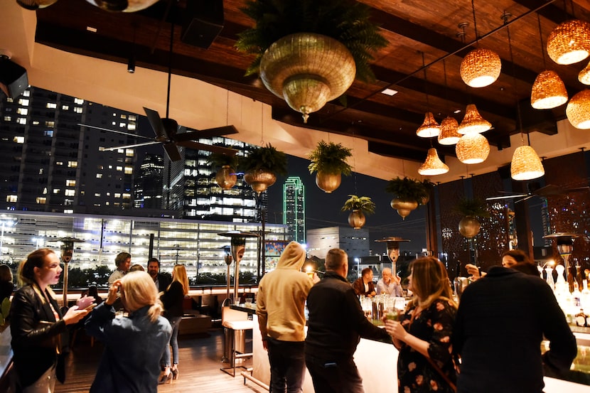 Cigars with a view: The rooftop bar at Te Deseo, early in the evening.