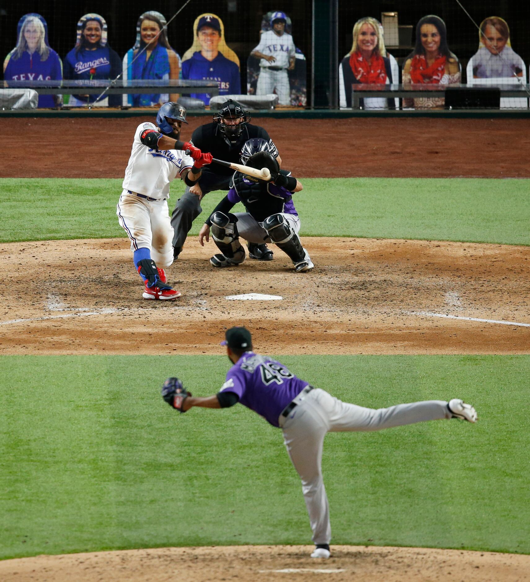Texas Rangers second baseman Rougned Odor (12) hits a double off of Colorado Rockies...