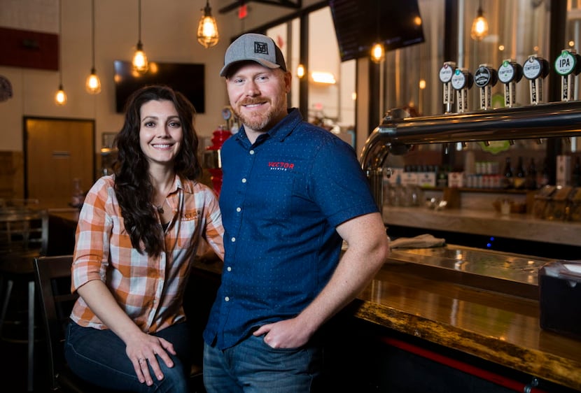 Veronica and Craig Bradley, owners of Vector Brewing, pose for a portrait at Lakewood...